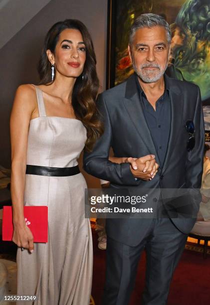 Amal Clooney and George Clooney attend The Prince's Trust and TKMaxx & Homesense Awards 2023 at the Theatre Royal Drury Lane on May 16, 2023 in...