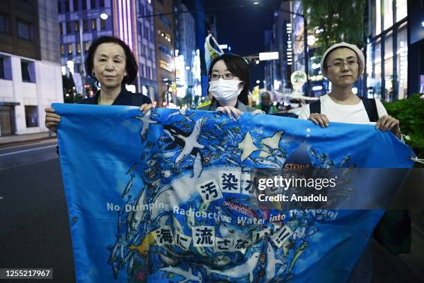 People protest against the plan of Japan government and Tokyo Electric Power Company to release the massive radioactive water stockpile from...