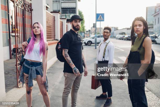 portrait of group of friends in the city - four people diversity stock pictures, royalty-free photos & images