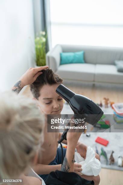 214 Boy Drying Hair Photos and Premium High Res Pictures - Getty Images