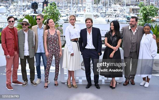 Swedish film director and President of the Jury of the 76th Cannes Film Festival Ruben Ostlund poses with members of the jury US actor Paul Dano,...