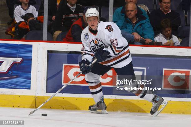 Ales Hemsky of the Edmonton Oilers skates with the puck during a NHL hockey game against the Washington Capitals at MCI Center on January 11, 2004 in...