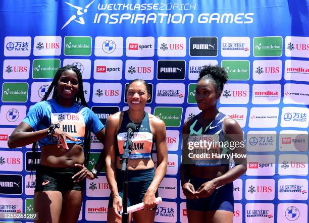 Candace Hill, Allyson Felix and Tianna Bartoletta speak to the media after a first place finish in the women's 3 x 100 meter relay during the...