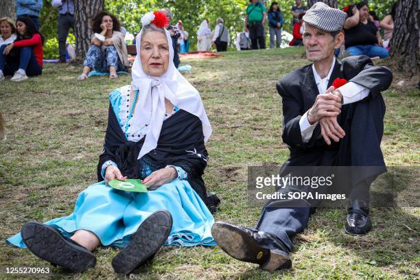 Couple of chulapos, typical Madrid characters seen resting during the festival of San Isidro organized by the Madrid City Council. On May 15, the...