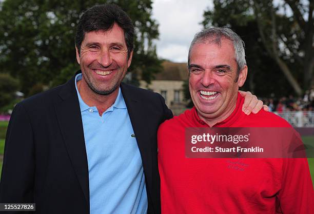 Ryder Cup captain Jose Maria Olazabal congratulates Paul McGinley, captain of the Great Britain and Ireland team after the final day's singles...