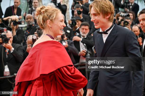 Uma Thurman and Levon Roan Thurman-Hawke at the "Jeanne du Barry" Screening & Opening Ceremony Red Carpet at the 76th Cannes Film Festival held at...