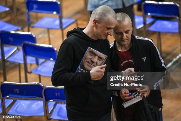 Donald Tusk supporters are seen at the end of the meeting, after they sign Tusk's latest book, on May 15 in Krakow, Poland. Chairman Donald Tusk's...