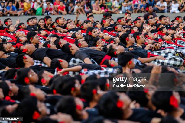 Balinese student dancers perform the Kecak dance during the National Education Day in Klungkung, Bali, Indonesia, May 16, 2023. About 1,000 students...