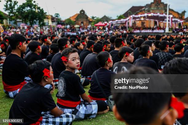 Balinese student dancers perform the Kecak dance during the National Education Day in Klungkung, Bali, Indonesia, May 16, 2023. About 1,000 students...