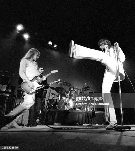 Chuck Panozzo, John Panozzo, James "JY" Young and Dennis DeYoung of STYX performs during Z-93 & U.S. Marines Toys for Tots at The OMNI Coliseum in...