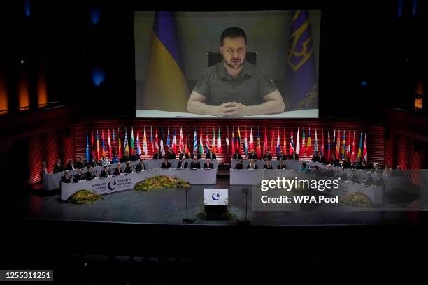 Ukraine's President Volodymyr Zelenskyy addresses, via video link, the opening ceremony of the Council of Europe summit on May 16, 2023 in Reykjavik,...