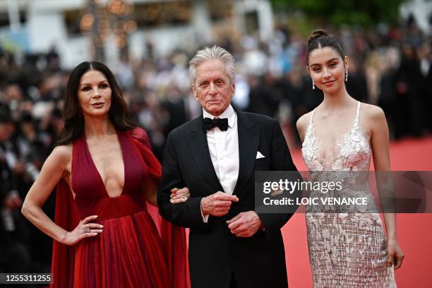 Actor and Honorary Palme d'or of the 76th Festival de Cannes Michael Douglas arrives with his wife British actress Catherine Zeta-Jones and daughter...