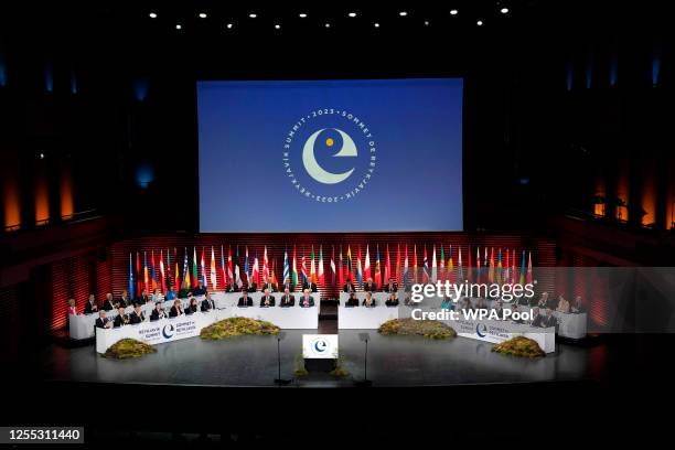 Heads of state and government stand during the opening of the Council of Europe summit on May 16, 2023 in Reykjavik, Iceland. Leaders from across the...