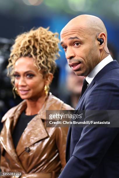 Thierry Henry looks on with Kate Abdo prior to the UEFA Champions League semi-final second leg match between FC Internazionale and AC Milan at Stadio...