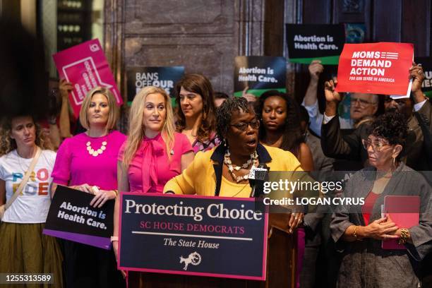 Abortion rights advocates and lawmakers hold a press conference before debate of a bill that would restrict abortions after six weeks, at the South...