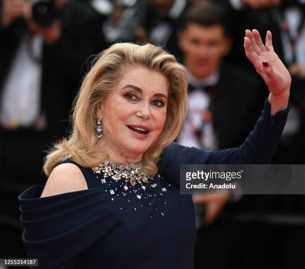 French actress Catherine Deneuve arrives for the opening ceremony and the screening of the film "Jeanne du Barry" during the 76th edition of the...
