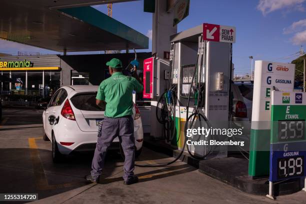 Worker at a Petrobras gas station in Sao Paulo, Brazil, on Tuesday, May 16, 2023. Brazilian oil producer Petroleo Brasileiro SA announced changes to...