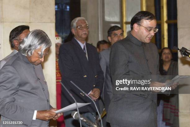 Arun Jaitley takes oath as a cabinet minister from Indian President A.P.J. Abdul Kalam at the Presidential Palace in New Delhi 29 January 2003....