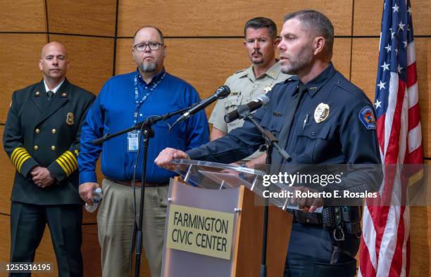 Farmington Deputy Police Chief Baric Crum speaks during a press conference to give details about a mass shooting in which a gunman shot randomly at...