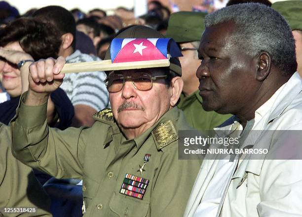 Cuban Defense Minister Raúl Castro is seen next to government official Esteban Lazo during an anti-war demonstration in La Habana, Cuba 15 February...