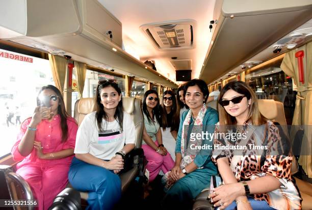 Co-founder, Ashoka Centre for a People-Centric Energy Transition Mahua Acharya along with female pilot and other Bus women staff at the flag-off...