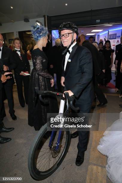 Thierry Fremaux with his bicycle leaves the "Jeanne du Barry" the screening and premiere at the 76th annual Cannes film festival at Palais des...