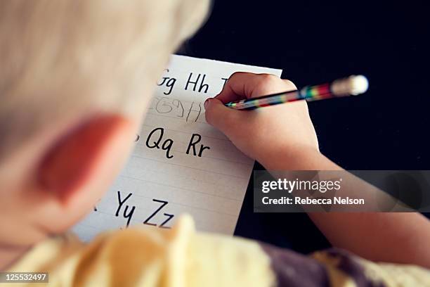 Child Copy Letters Kids Alphabet Background Photos and Premium High Res Pictures - Getty ...