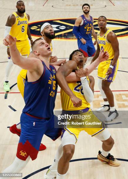 Denver, CO, Tuesday, May 16, 2023 - Denver Nuggets center Nikola Jokic battles Los Angeles Lakers forward Rui Hachimura for a rebound in game one of...