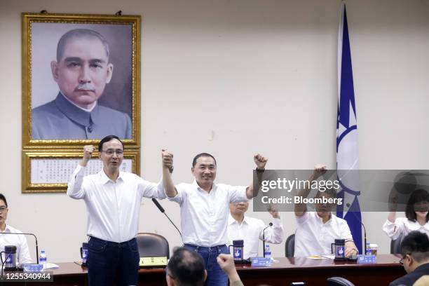 Hou Yu-ih, mayor of New Taipei City, second left, with Eric Chu, chairman of the Kuomintang party, left, during a news conference in Taipei, Taiwan,...