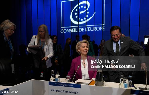 President of the European Commission Ursula von der Leyen and Spain's Foreign Minister Jose Manuel Albares Bueno take seat to attend the closing...