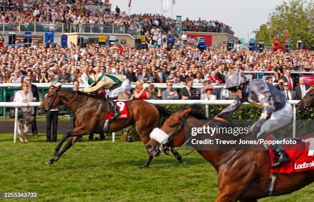 Jockey Daniel Tudhope riding Doc Hay winning the Portland Handicap at Doncaster, 15th September 2012. Placed second Irish Jockey Kieren Fallon riding...