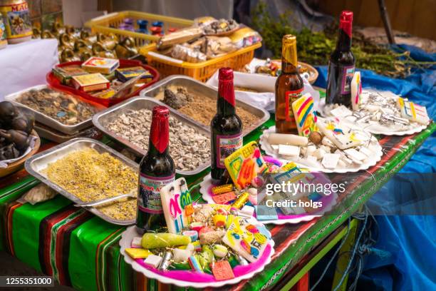 stall at the witches' market, also known as el mercado de las brujas and la hechiceria, is a popular tourist attraction located in cerro cumbre - la paz - bolivia stock pictures, royalty-free photos & images