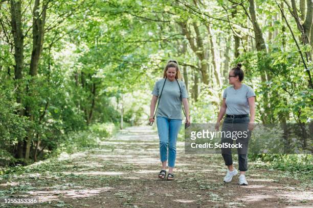 the happy couple - woodland walk stock pictures, royalty-free photos & images