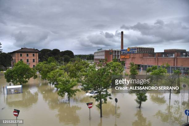 Picture taken in Cesena on May 17, 2023 shows a flooded supermarket area after heavy rains have caused major floodings in central Italy, where trains...
