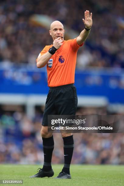 Referee Anthony Taylor gestures during the Premier League match between Everton FC and Manchester City at Goodison Park on May 14, 2023 in Liverpool,...