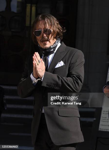 Johnny Depp attends day 4 of his libel case against The Sun Newspaper at the Royal Courts of Justice, Strand on July 10, 2020 in London,...