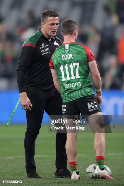 Sam Burgess talks to Damien Cook of the Rabbitohs during the round nine NRL match between the South Sydney Rabbitohs and the Wests Tigers at Bankwest...