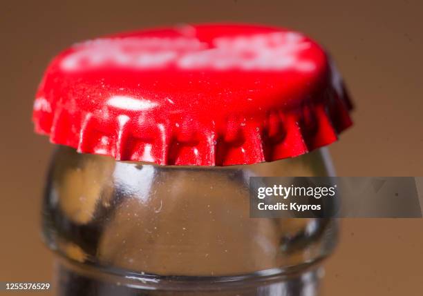 soft drink bottle with metal lid - cola bottle stock pictures, royalty-free photos & images