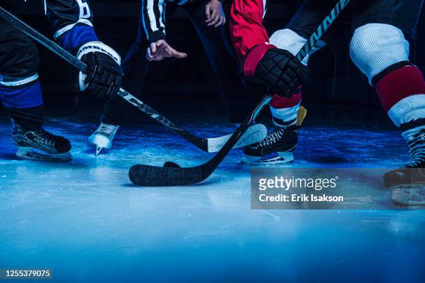 hockey players and referee starting match - ice hockey stock pictures, royalty-free photos & images