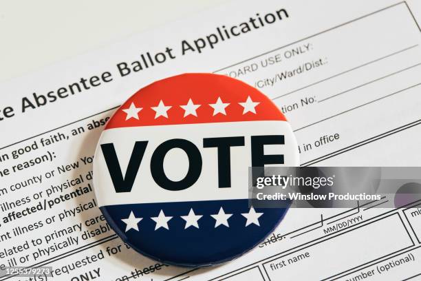vote pin on absentee ballot application - absentee ballot stock pictures, royalty-free photos & images