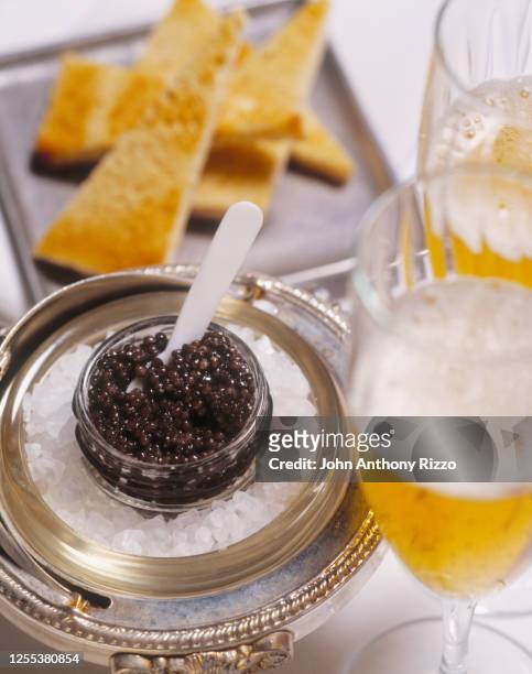 caviar and champagne - kaviaar stockfoto's en -beelden
