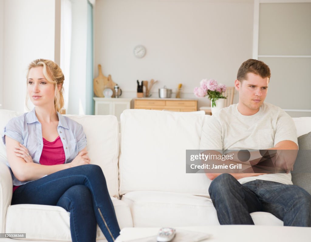 Couple fighting, looking away