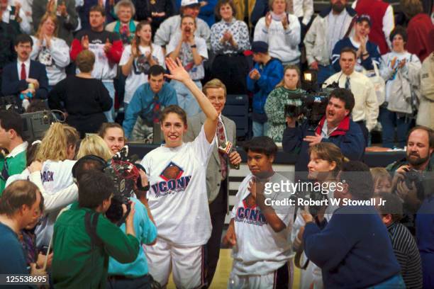 Rebecca Lobo and the rest of the University of Connecticut women's basketball team celebrate winning the Big East regular season championship en...