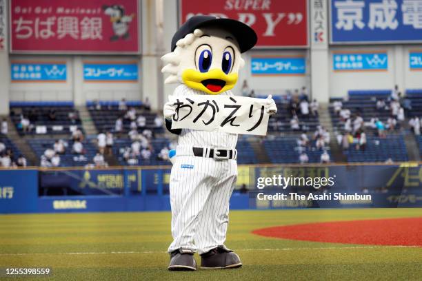 Chiba Lotte Marines mascot Ma-kun hold a banner reading 'welcome back' for fans prior to the game between Saitama Seibu Lions and Chiba Lotte Mrines...