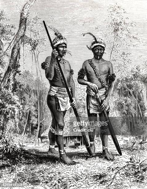eingeborene aus dem amazonasgebiet, zwei männer stehen draußen mit schlägern - amazon region stock-grafiken, -clipart, -cartoons und -symbole