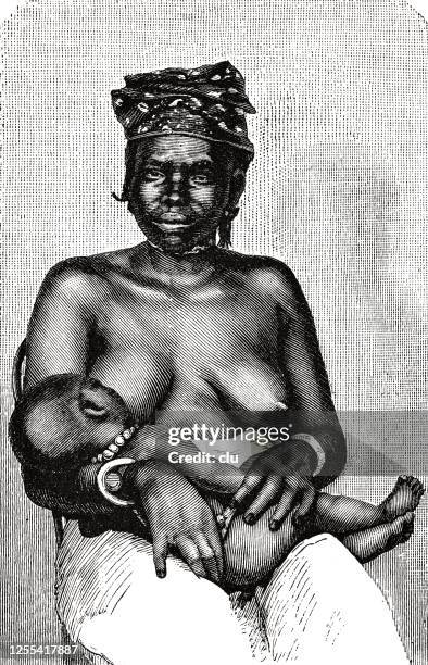 woman from bambara breastfeeding her child - west africa stock illustrations
