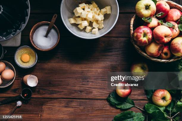 ingredients for baking apple cake - fall harvest table stock pictures, royalty-free photos & images