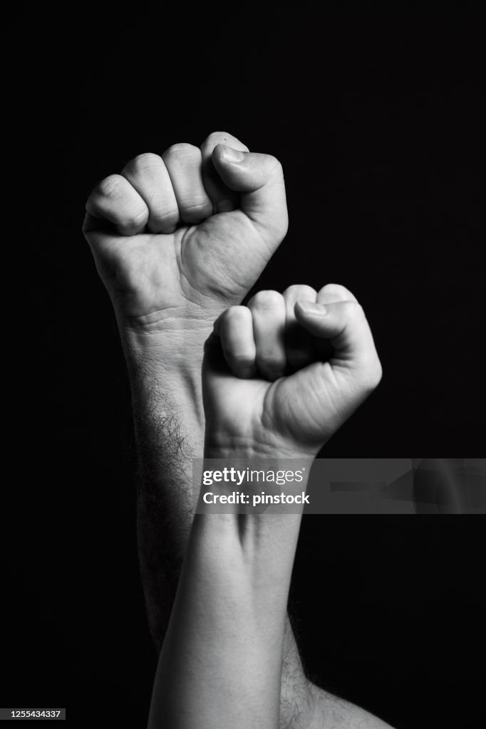 Protesting Hand On Black Background High-Res Stock Photo - Getty Images