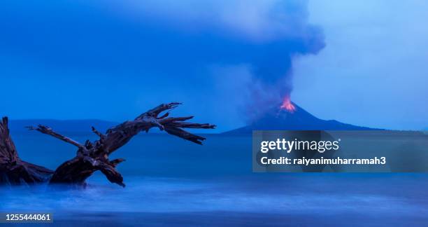 anak krakatau erupting, lampung, indonesia - anak krakatau stock-fotos und bilder