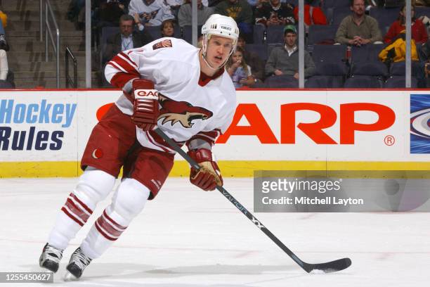 Ossi Vaananen of the Phoenix Coyotes skates with the puck during a NHL hockey game against the Washington Capitals at MCI Center on January 7, 2004...